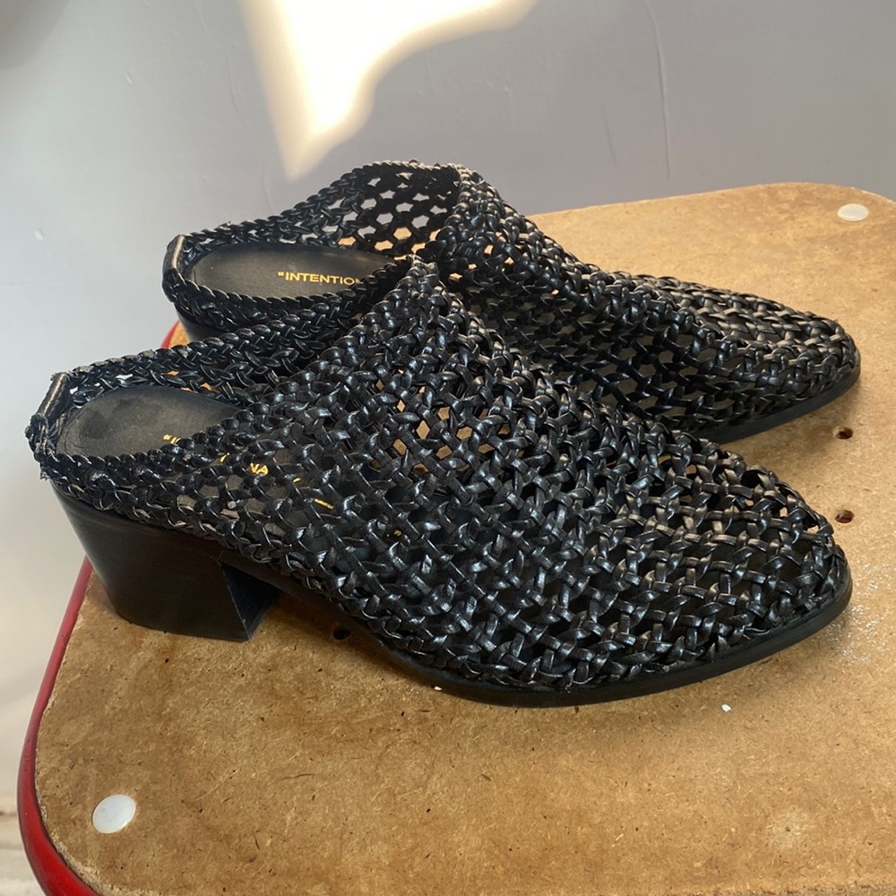 Intentionally blank black crocheted leather mules